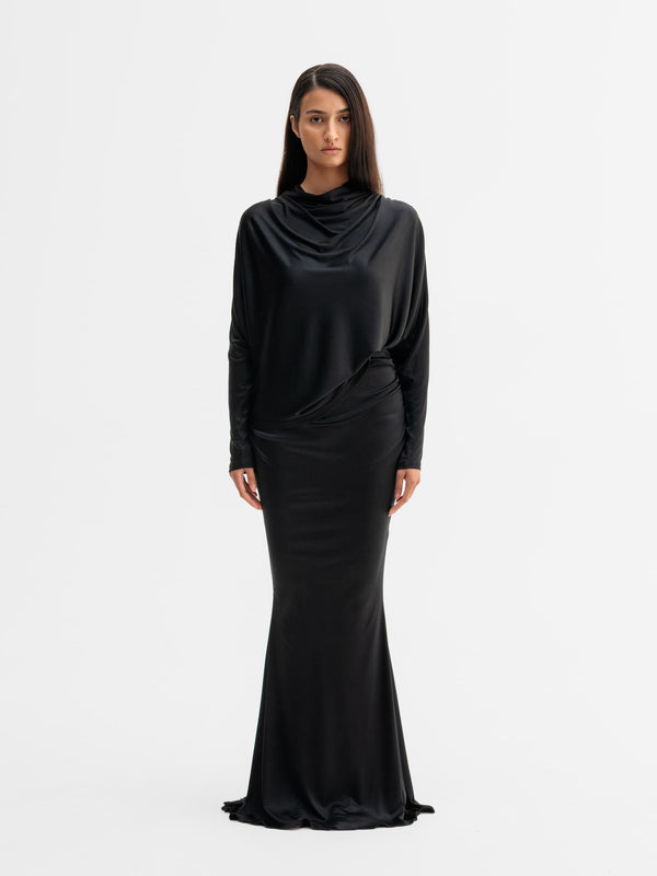 Model wearing Ahlvar Gallery Milly jersey blouse in Black