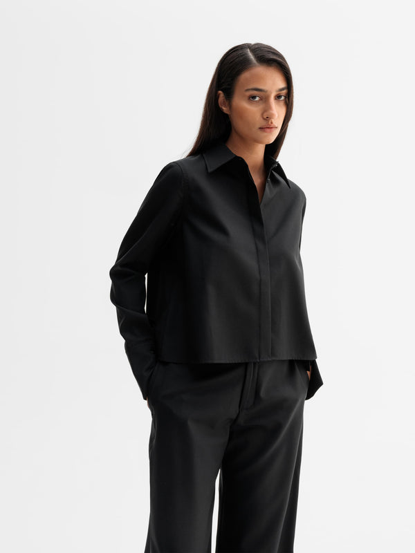 Model wearing Ahlvar Gallery Mindi wool shirt in Black