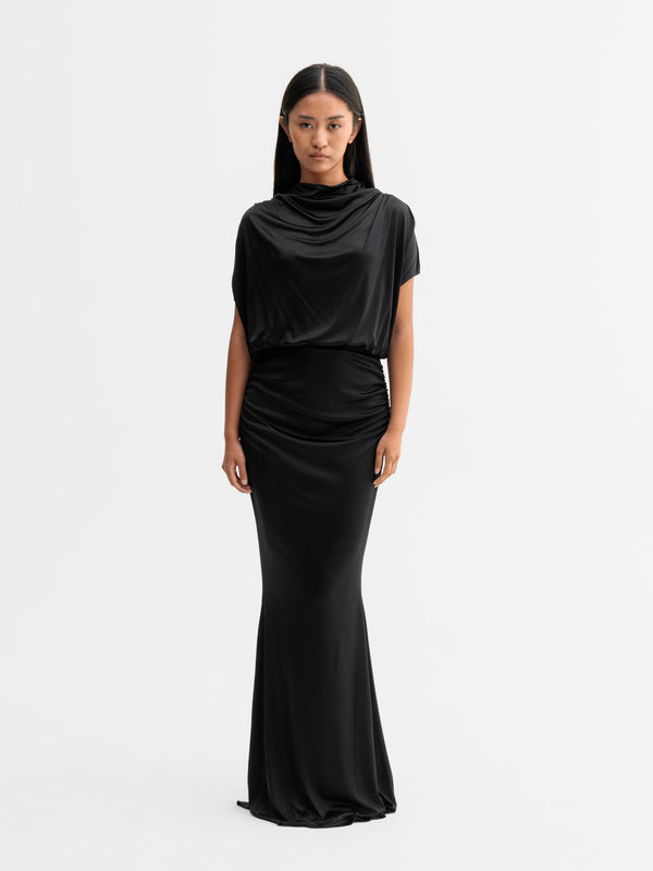 Model wearing Ahlvar Gallery Miya jersey dress in Black
