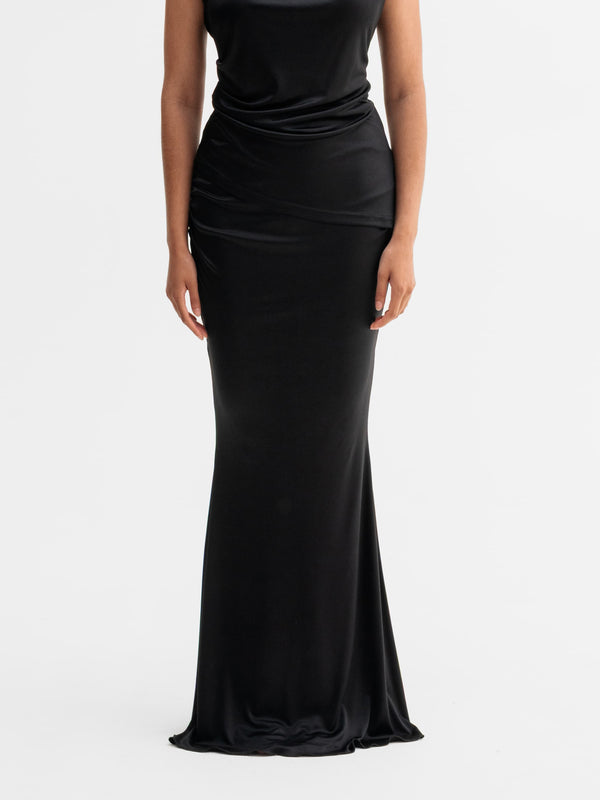 Model wearing Ahlvar Gallery Myra jersey skirt in Black