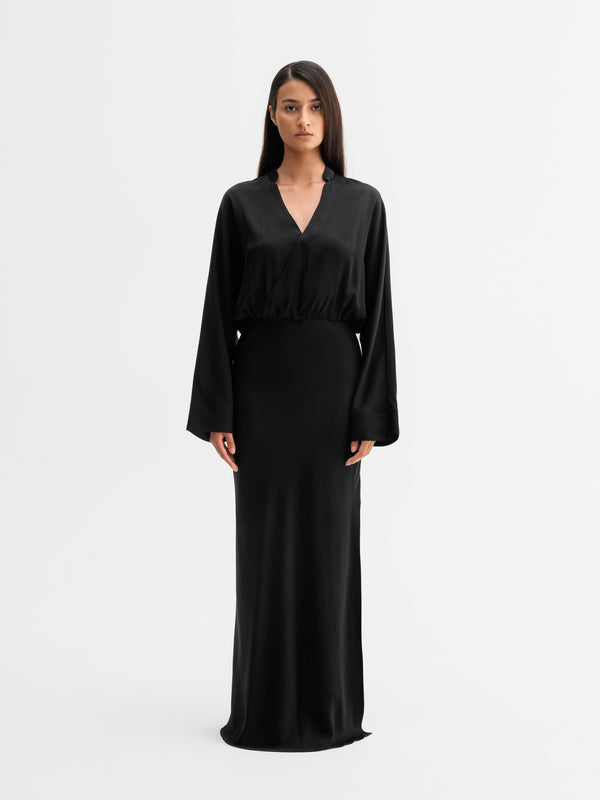 Model wearing Ahlvar Gallery Niva dress in Black