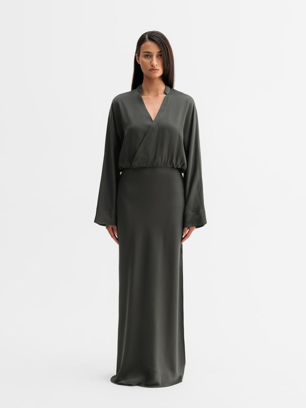 Model wearing Ahlvar Gallery Niva dress in Wood