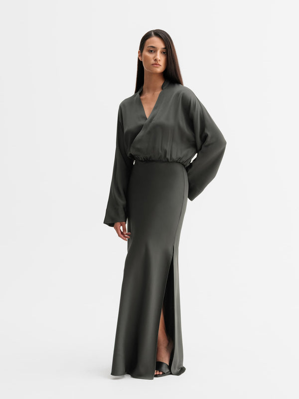 Model wearing Ahlvar Gallery Niva dress in Wood