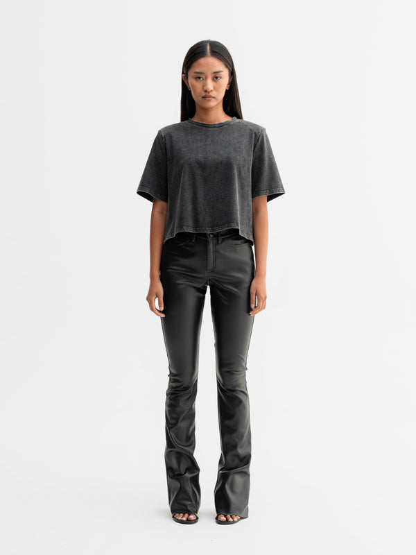 Model wearing Ahlvar Gallery Okaya cropped tee in Washed black