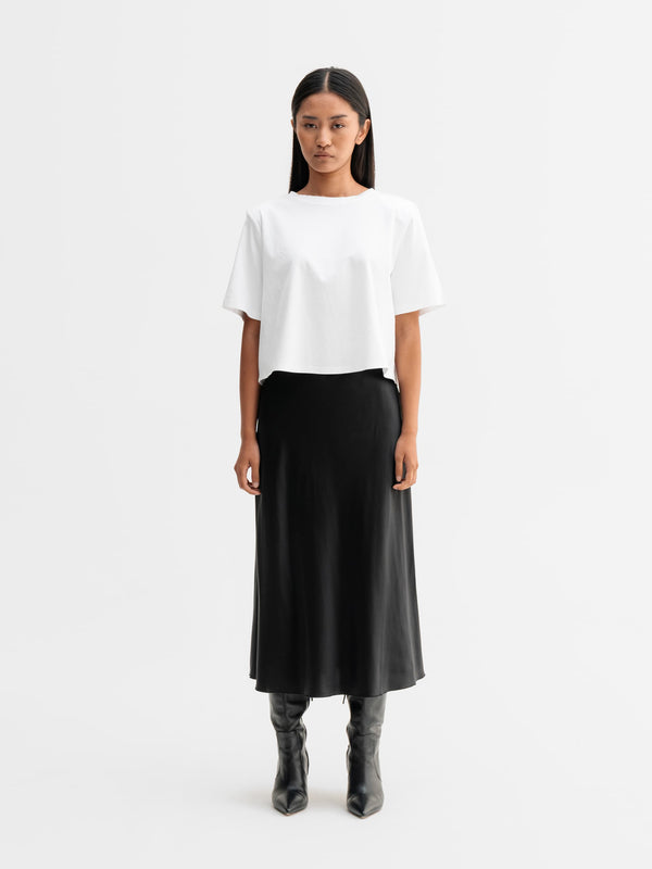 Model wearing Ahlvar Gallery Okaya cropped tee in White