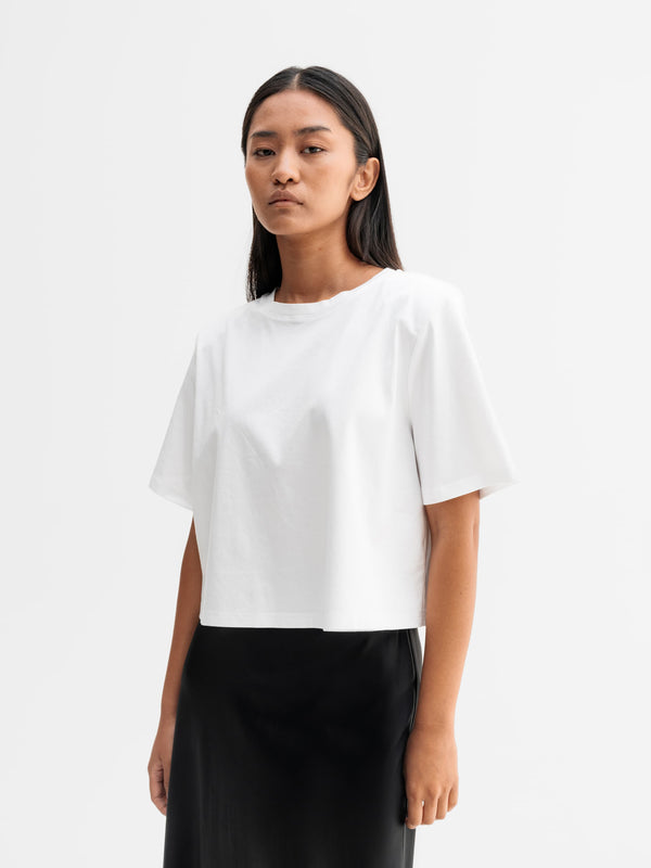 Model wearing Ahlvar Gallery Okaya cropped tee in White