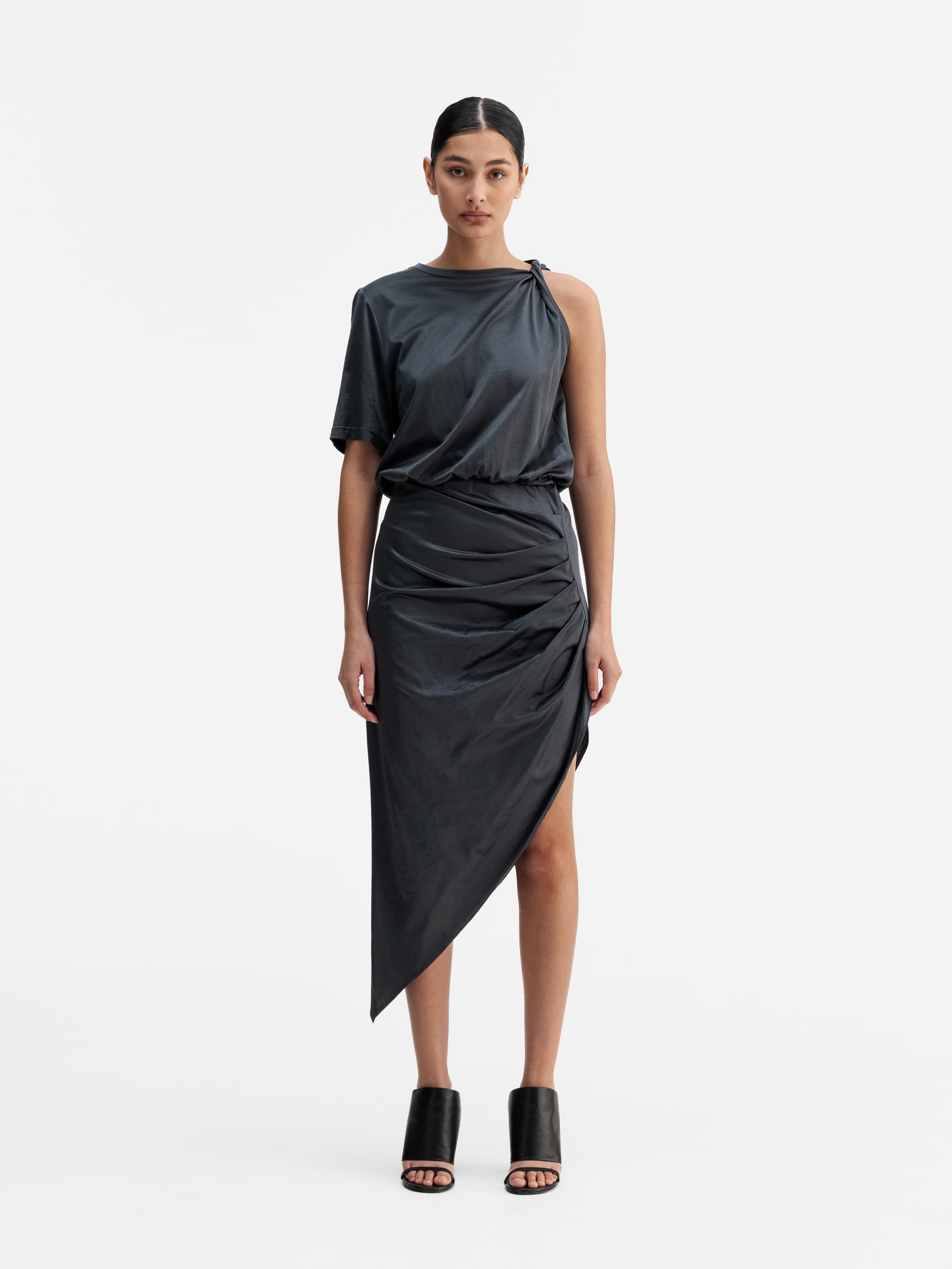 Model wearing Ahlvar Gallery Oki twisted dress dark grey