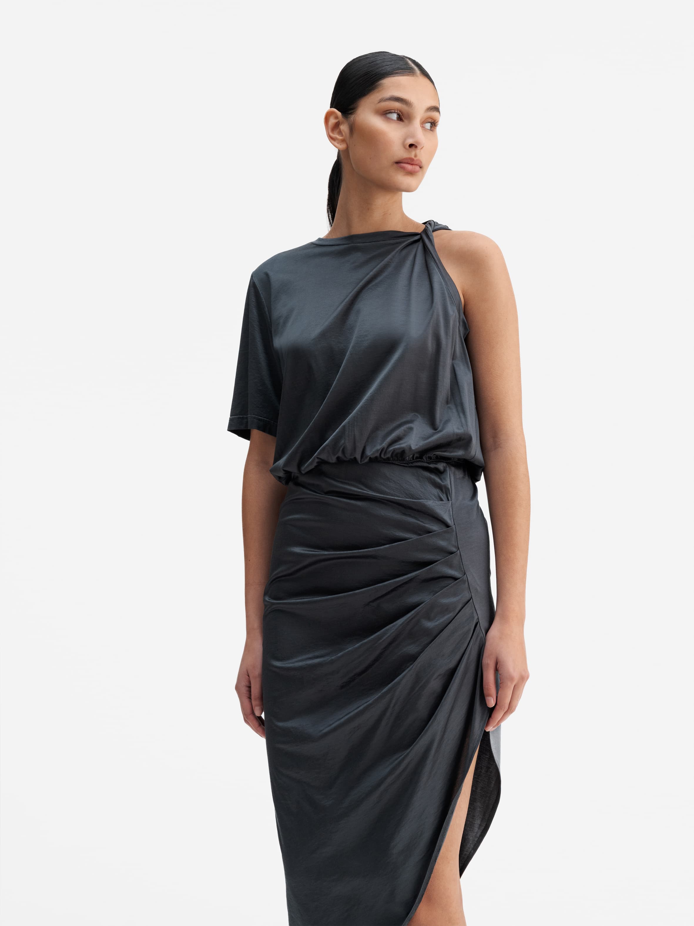 Model wearing Ahlvar Gallery Oki twisted dress dark grey