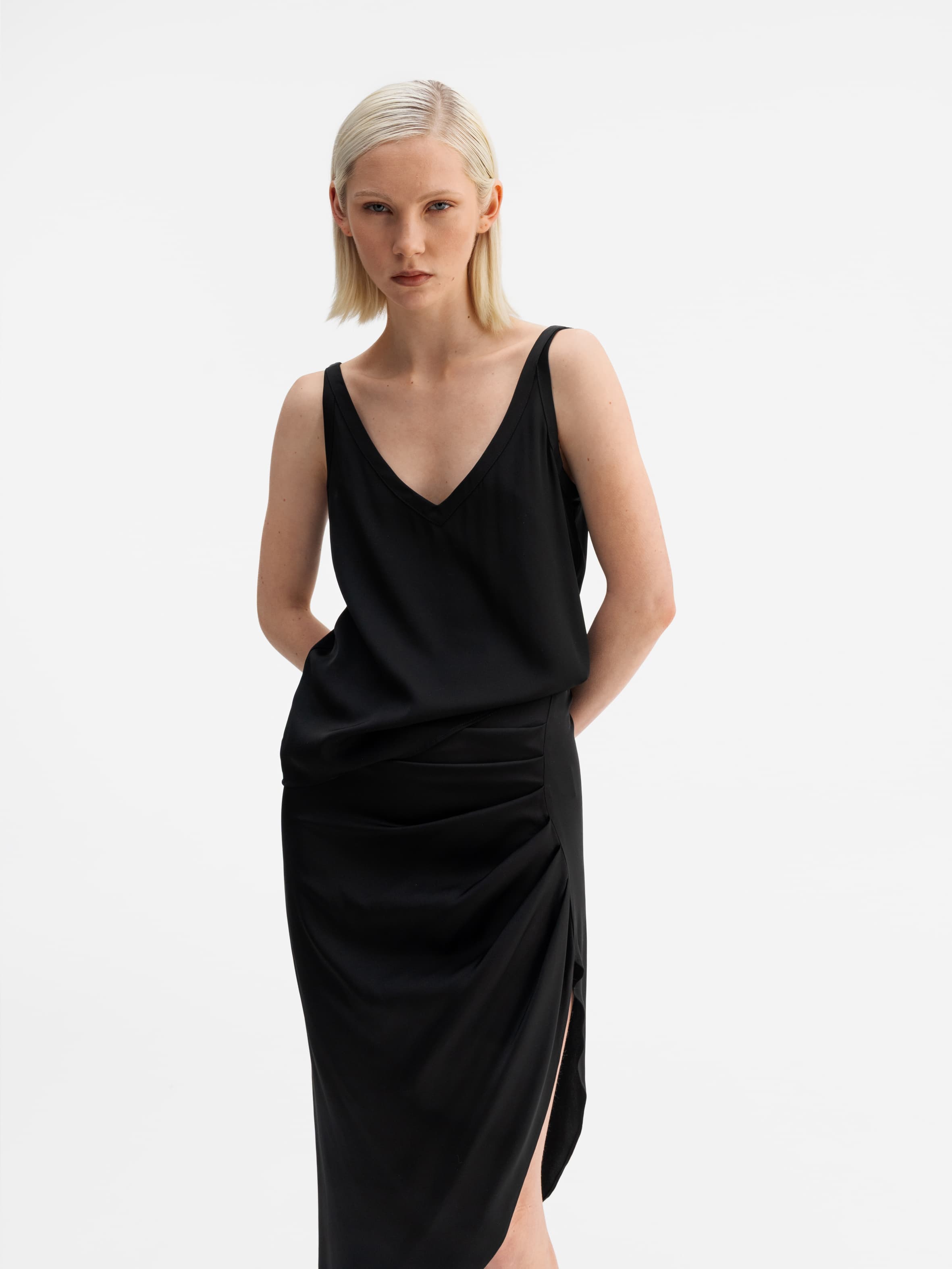 Model wearing Ahlvar Gallery Shin silk tank black