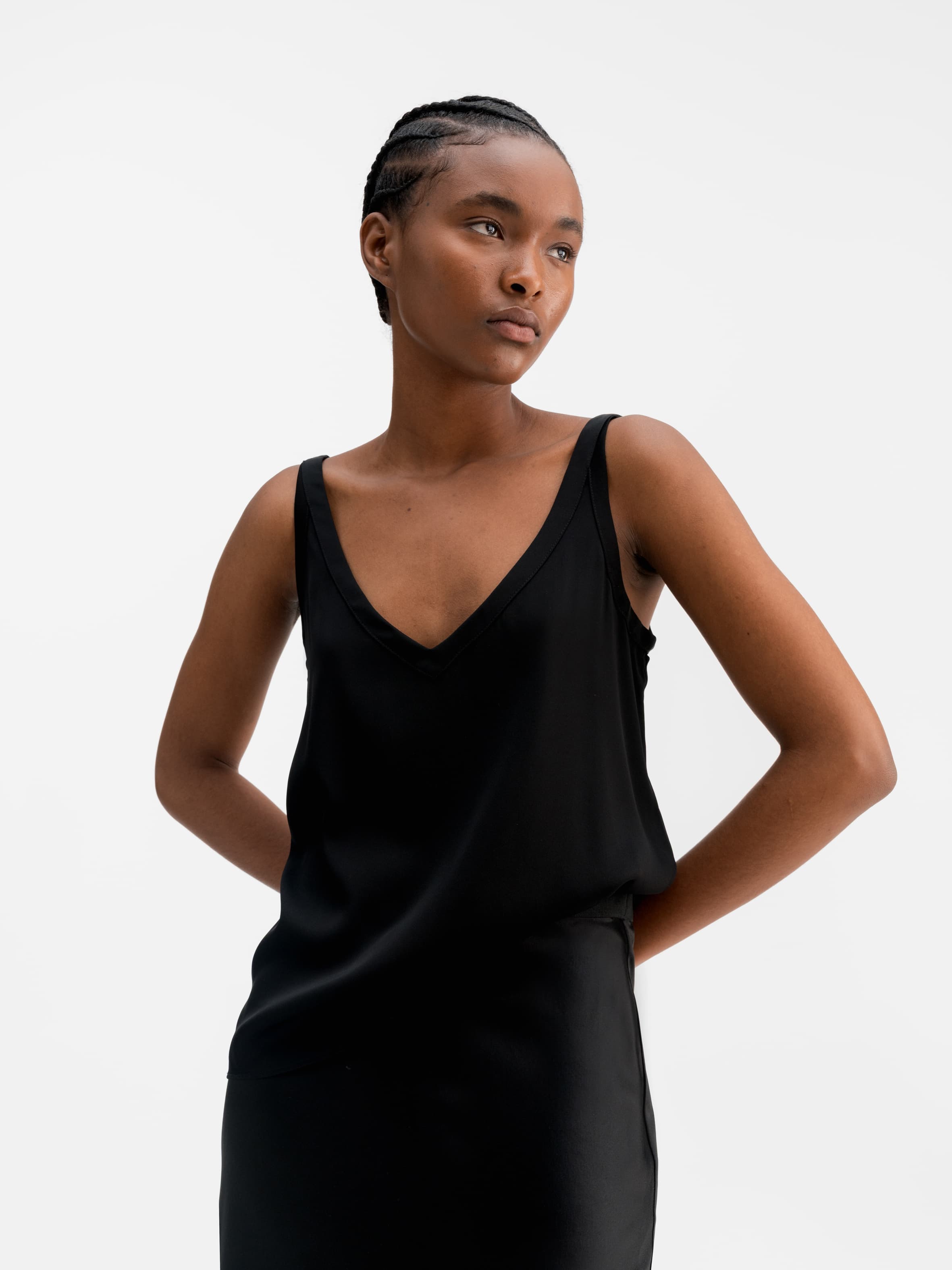 Model wearing Ahlvar Gallery Shin silk tank black
