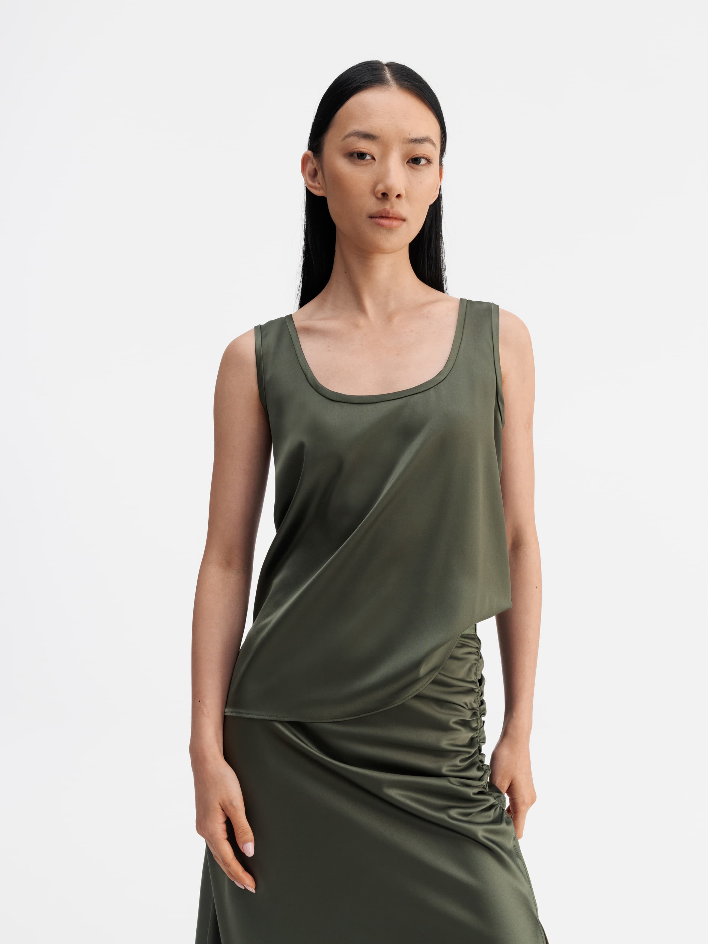 Model wearing Ahlvar Gallery Shiro satin tank olive green