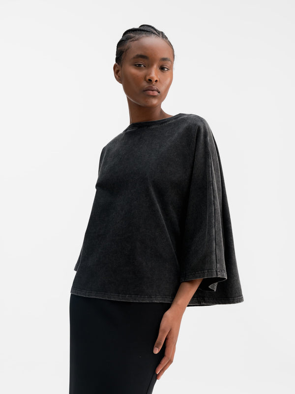 Model wearing Ahlvar Gallery Thea jersey tee in Washed black