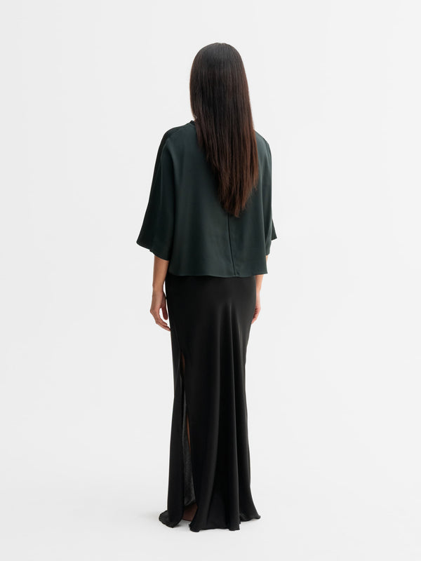 Back view of Ahlvar Gallery Thea silk tee in Deep forest