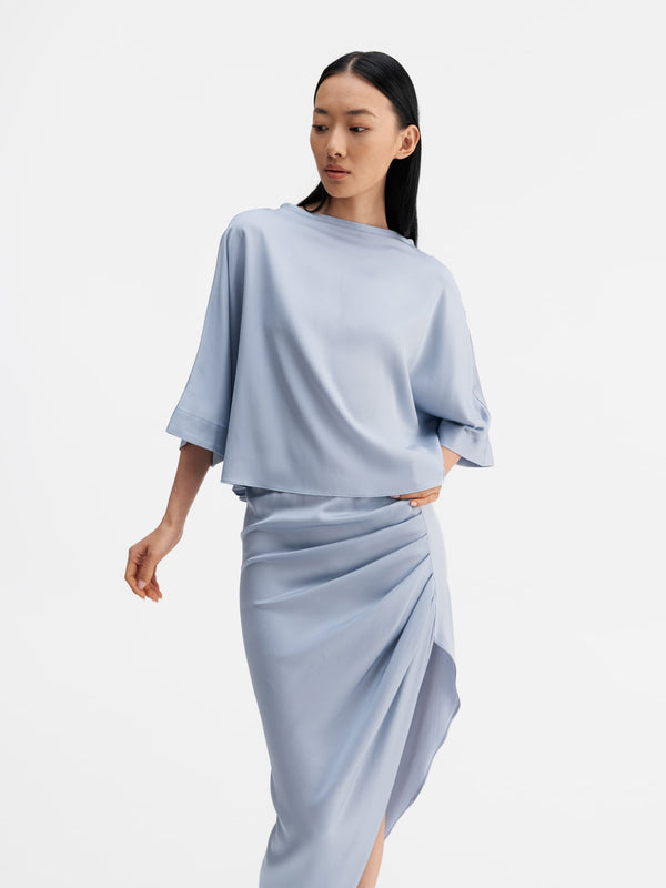 Model wearing Ahlvar Gallery Thea silk tee denim blue