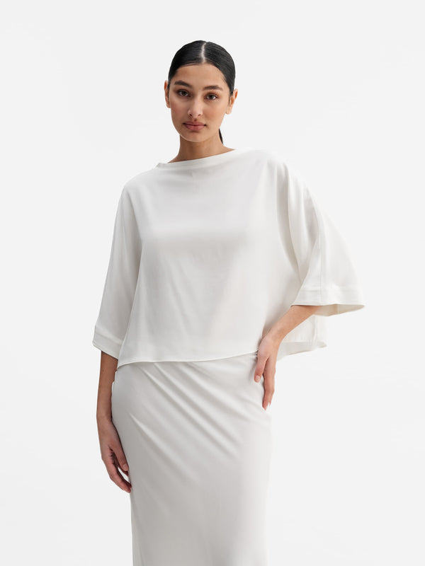 Model wearing Ahlvar Gallery Thea silk tee white