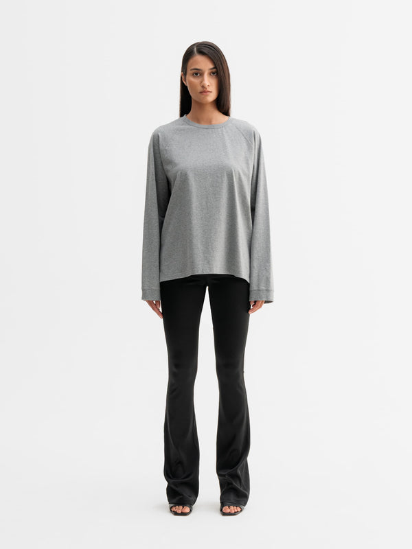 Model wearing Ahlvar Gallery Thelma LS tee in Grey melange