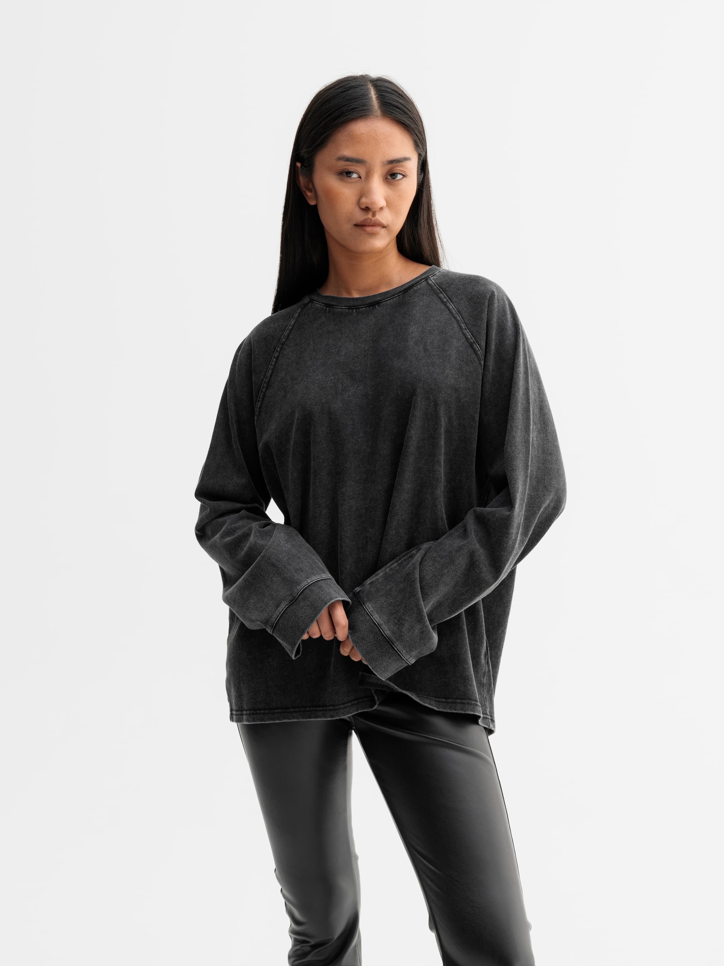 Model wearing Ahlvar Gallery Thelma LS tee in Washed black