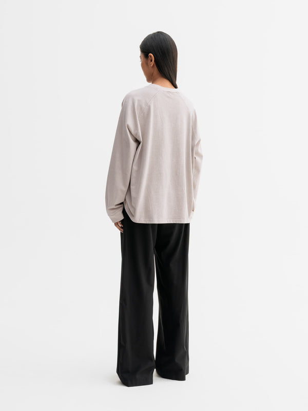 Back view of Ahlvar Gallery Thelma LS tee in Washed greige