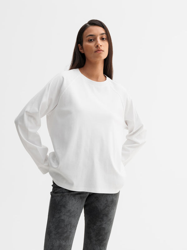 Model wearing Ahlvar Gallery Thelma LS tee in White