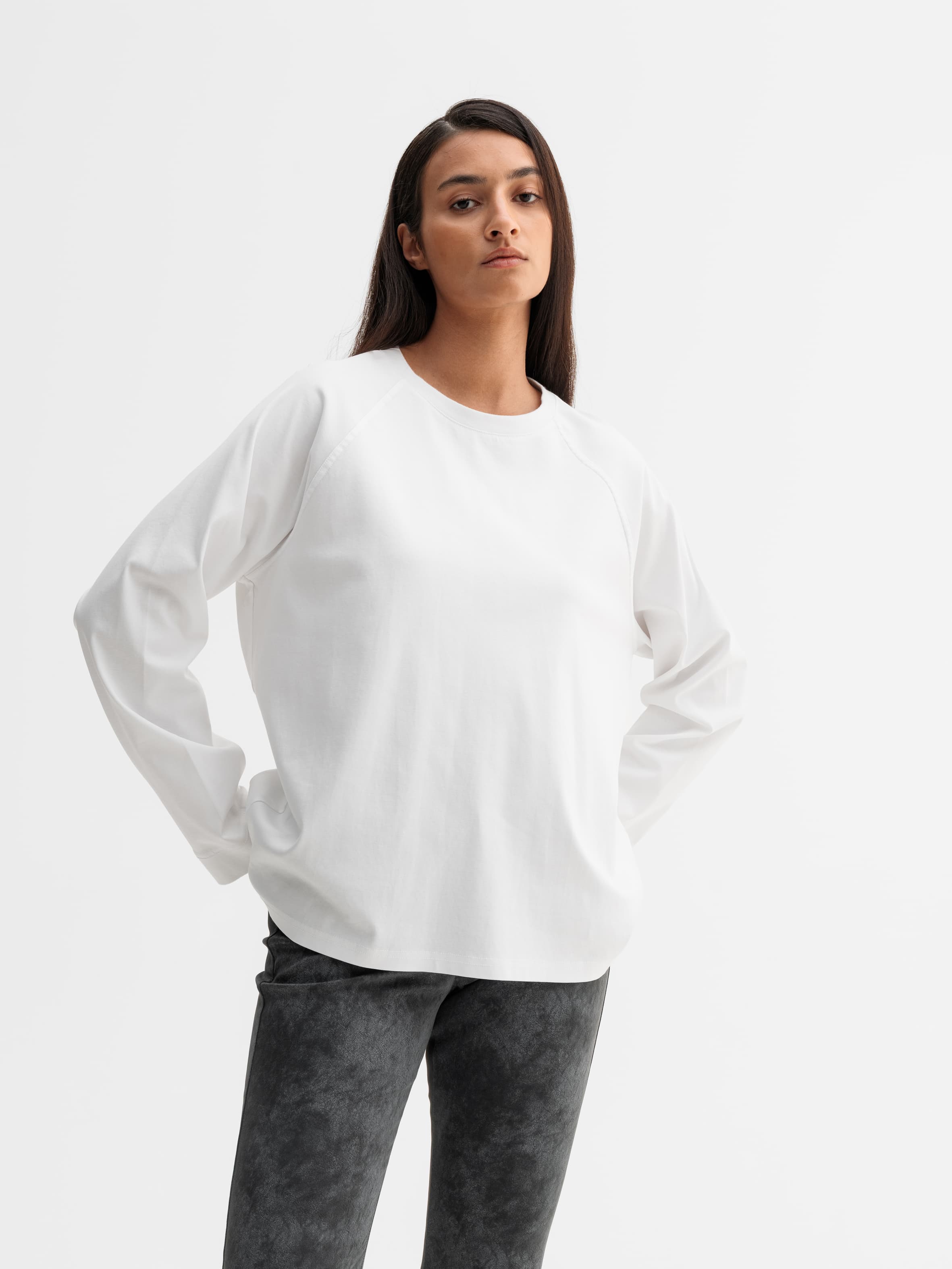 Model wearing Ahlvar Gallery Thelma LS tee in White