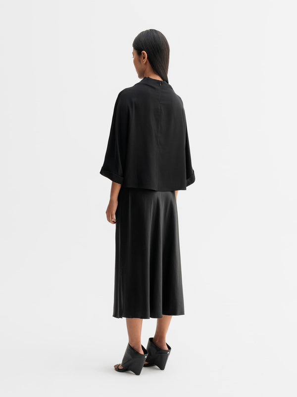 Back view of Ahlvar Gallery Thia silk tee in Black