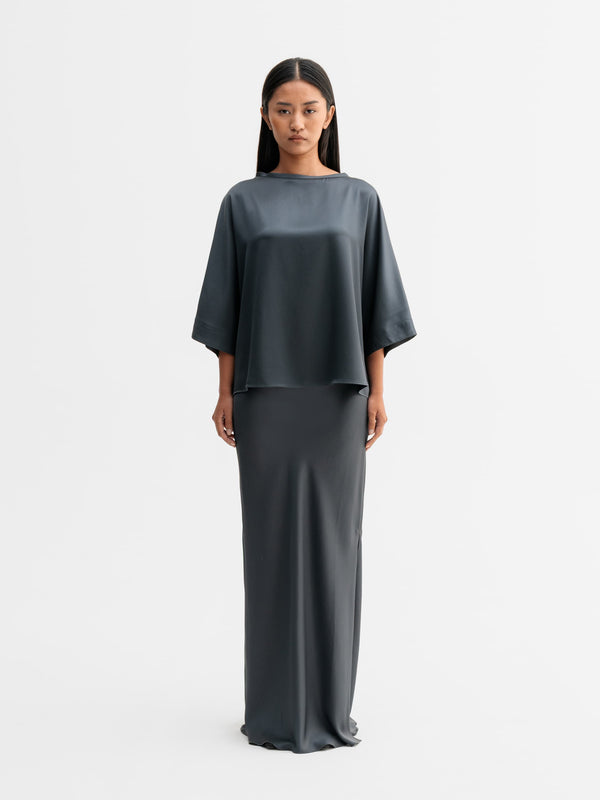 Model wearing Ahlvar Gallery Tori satin tee in Dark grey