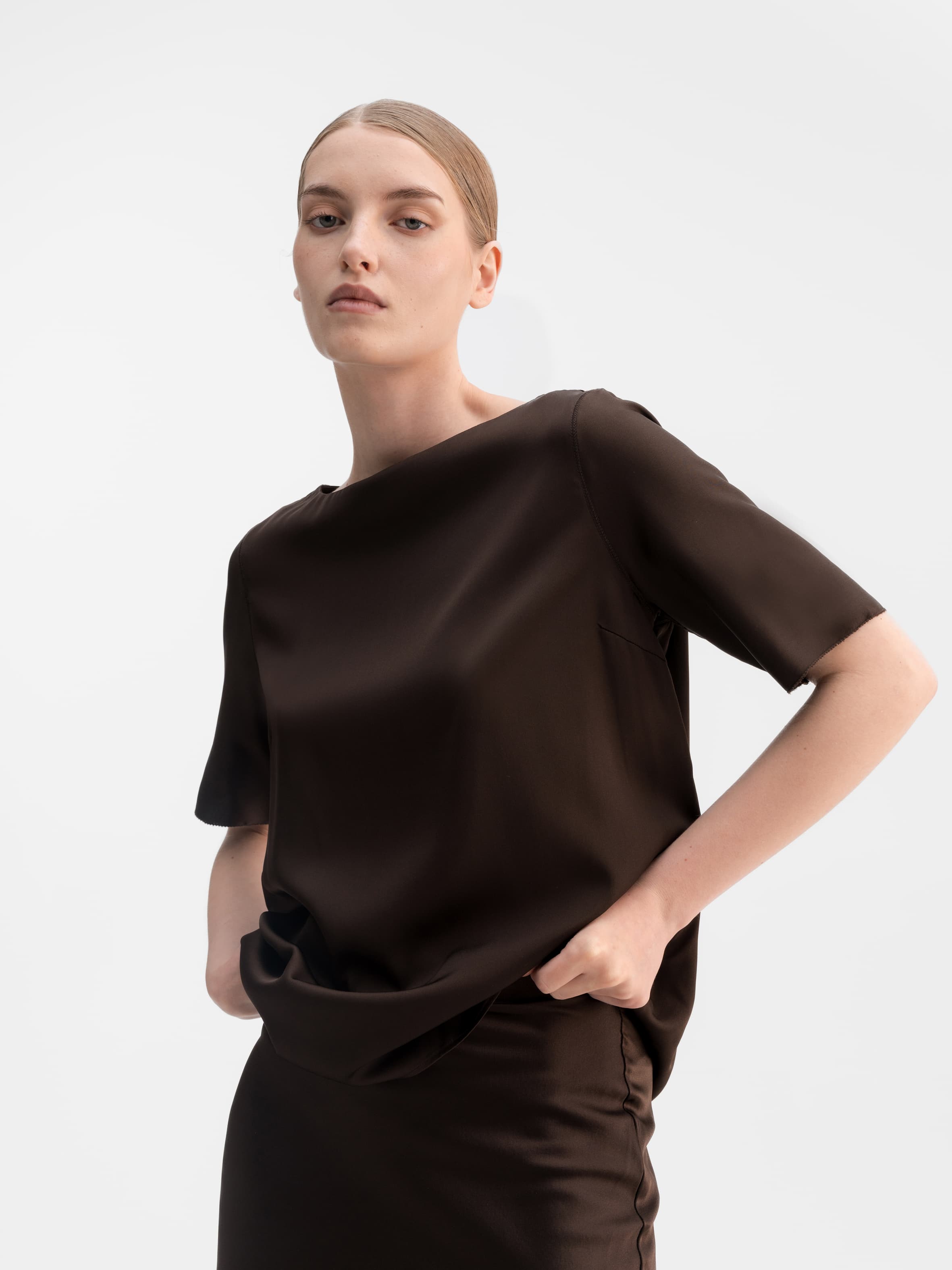 Model wearing Ahlvar Gallery Yoli silk blouse in Dark brown