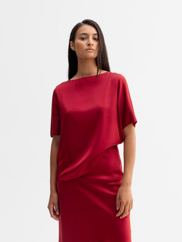 Model wearing Ahlvar Gallery Yoli silk blouse in Dark red
