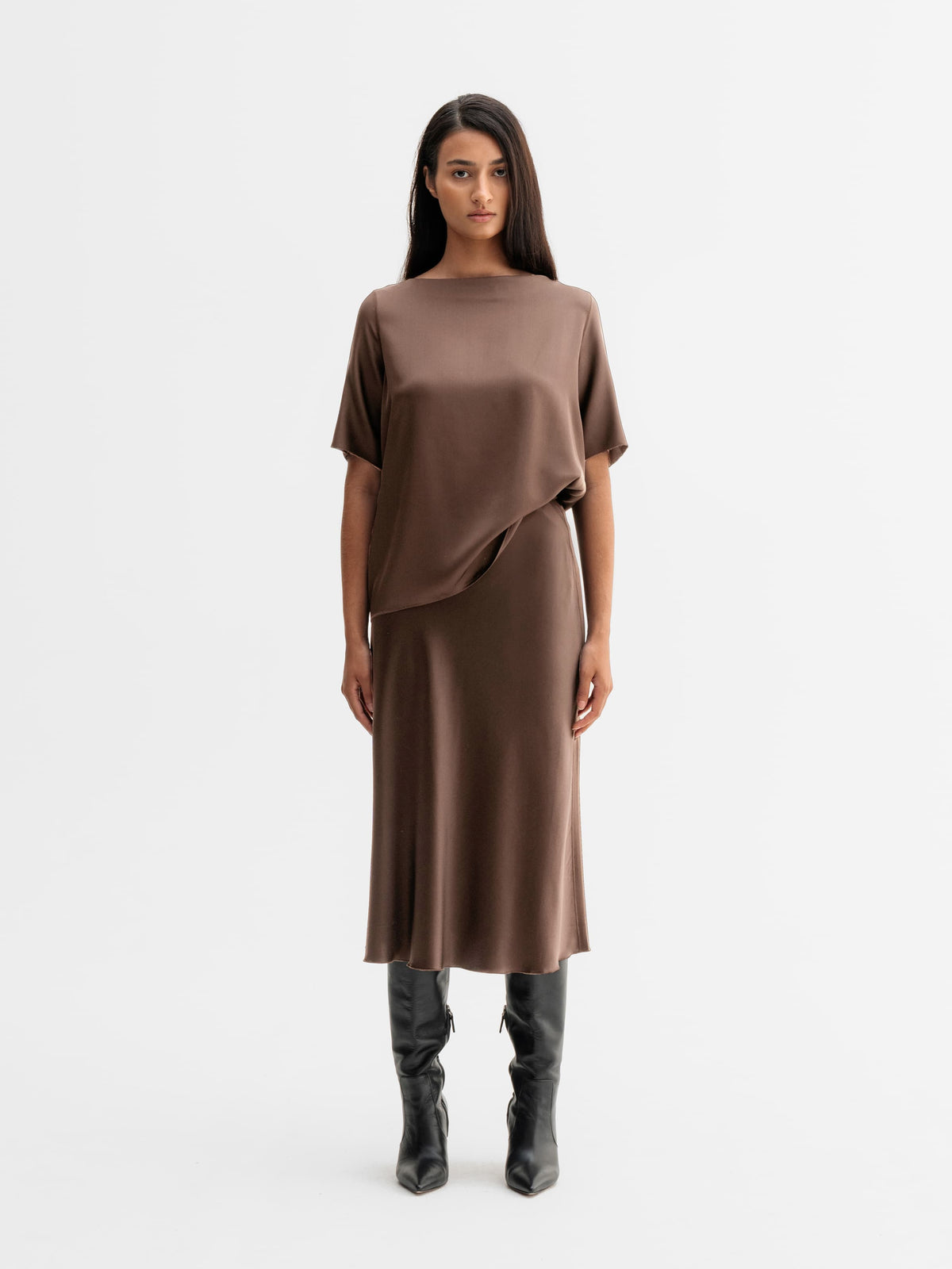 Model wearing Ahlvar Gallery Yoli silk blouse in Light brown