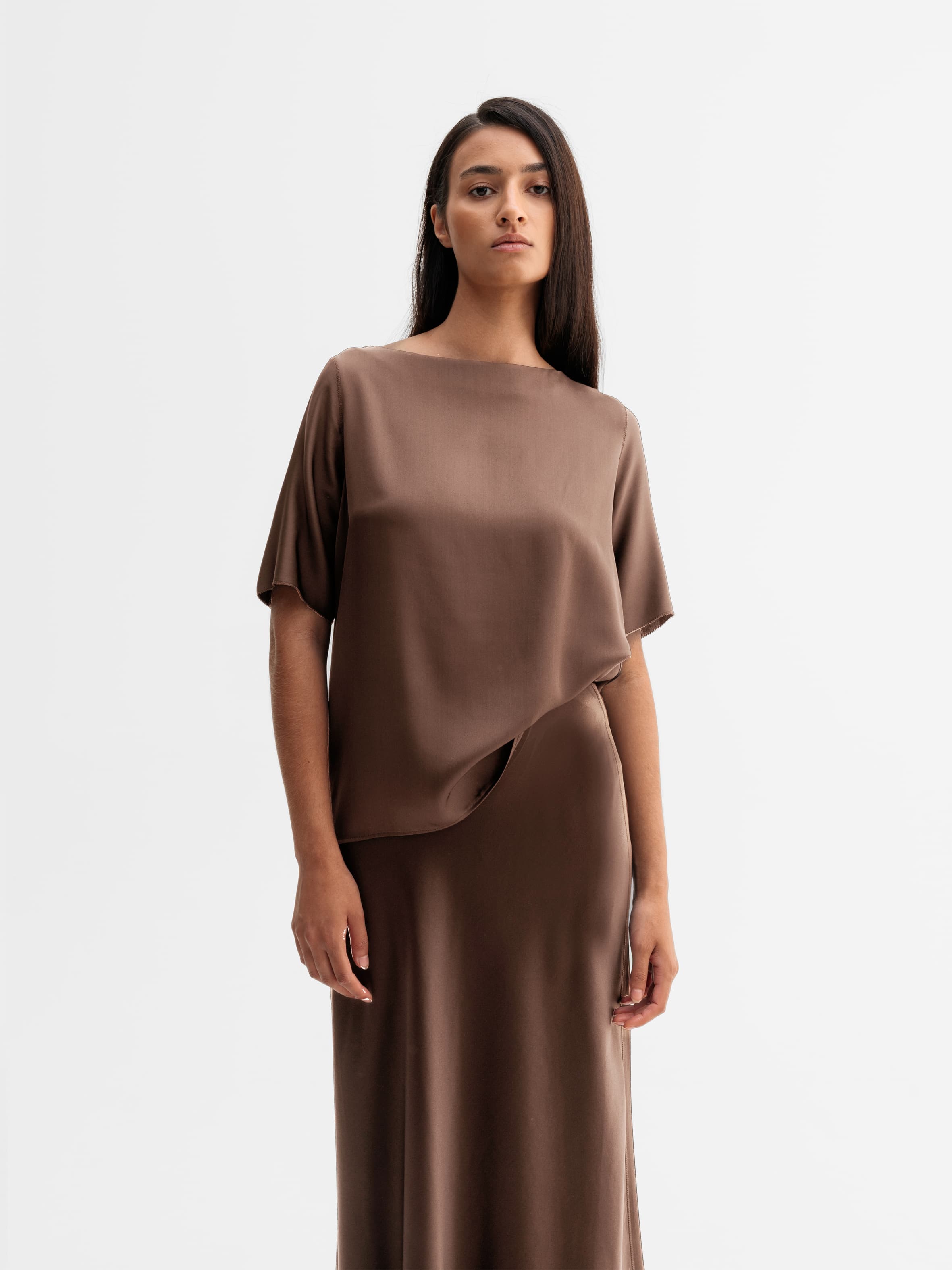 Model wearing Ahlvar Gallery Yoli silk blouse in Light brown