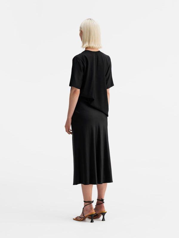 Back view of Ahlvar Gallery Yoli v-neck silk blouse black