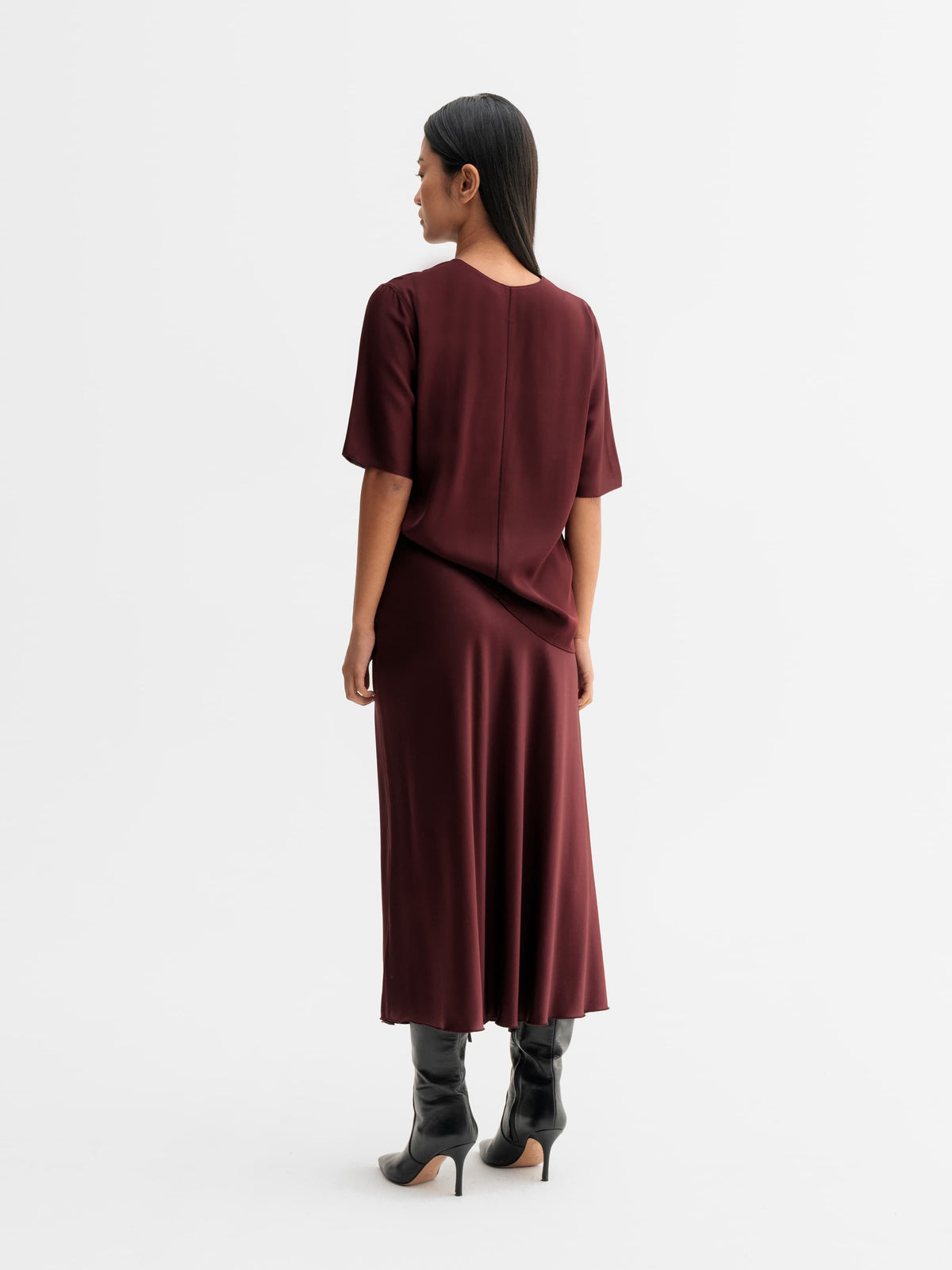 Back view of Ahlvar Gallery Yoli v-neck silk blouse in Burgundy