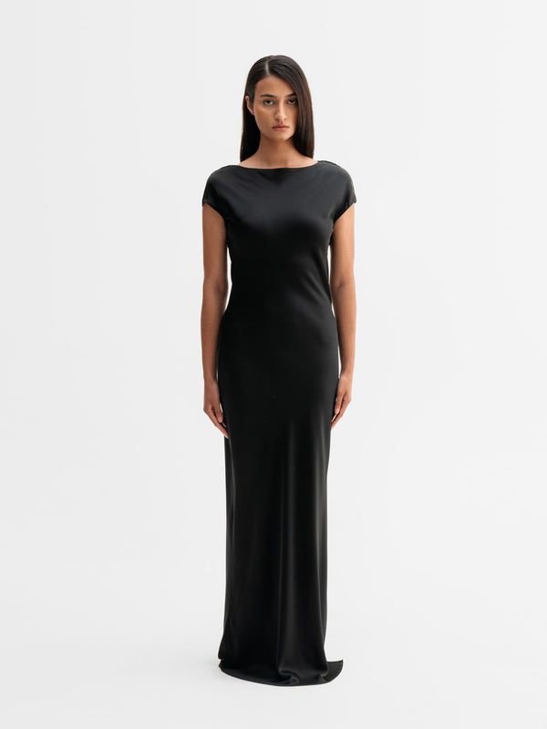 Model wearing Ahlvar Gallery Yuni satin dress in Black